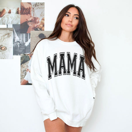 Crewneck for birthday gifts for mom. Woman wearing varsity mama sweatshirt, with bold print, comfortable sweatshirt for mothers days. 