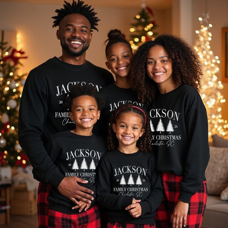 Custom family matching Christmas pajamas personalized with family last name and location.