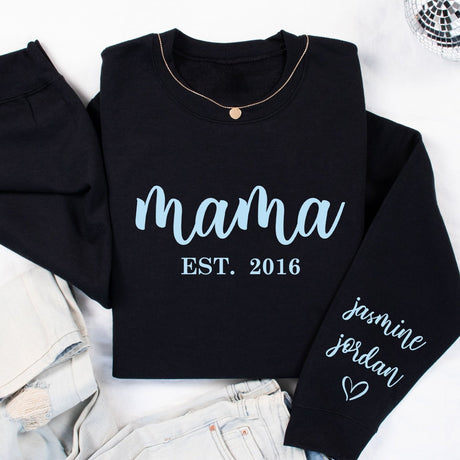 Cute cozy sweaters for mothers day with kids names and year. Thoughtful birthday or christmas gift for mom. 