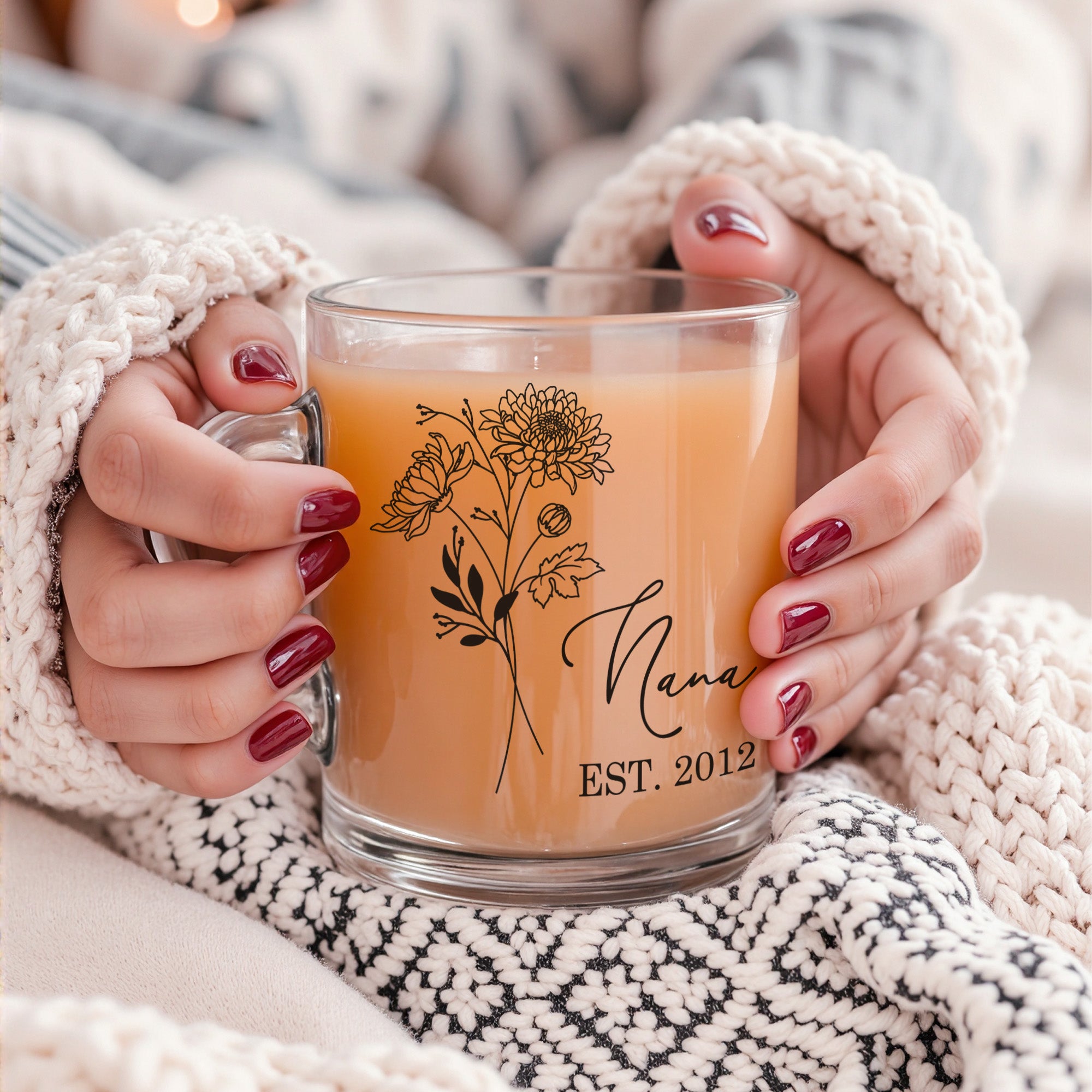 Custom birth flower design on personalized glass mug gift for women. Woman holding personalized custom coffee mug for her Mother’s Day orbirthday gift.