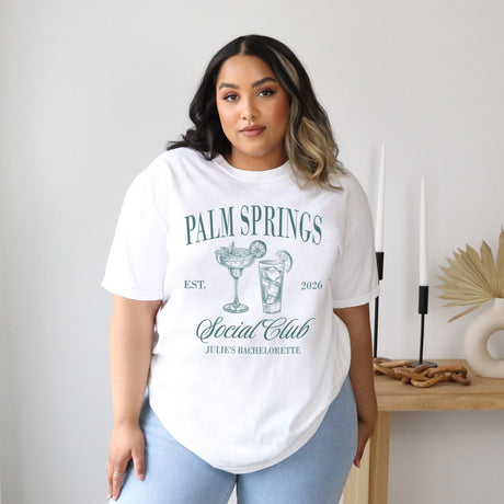 Custom bachelorette party shirts for bride and bridesmaids, featuring city name and Social Club print on soft Comfort Colors.