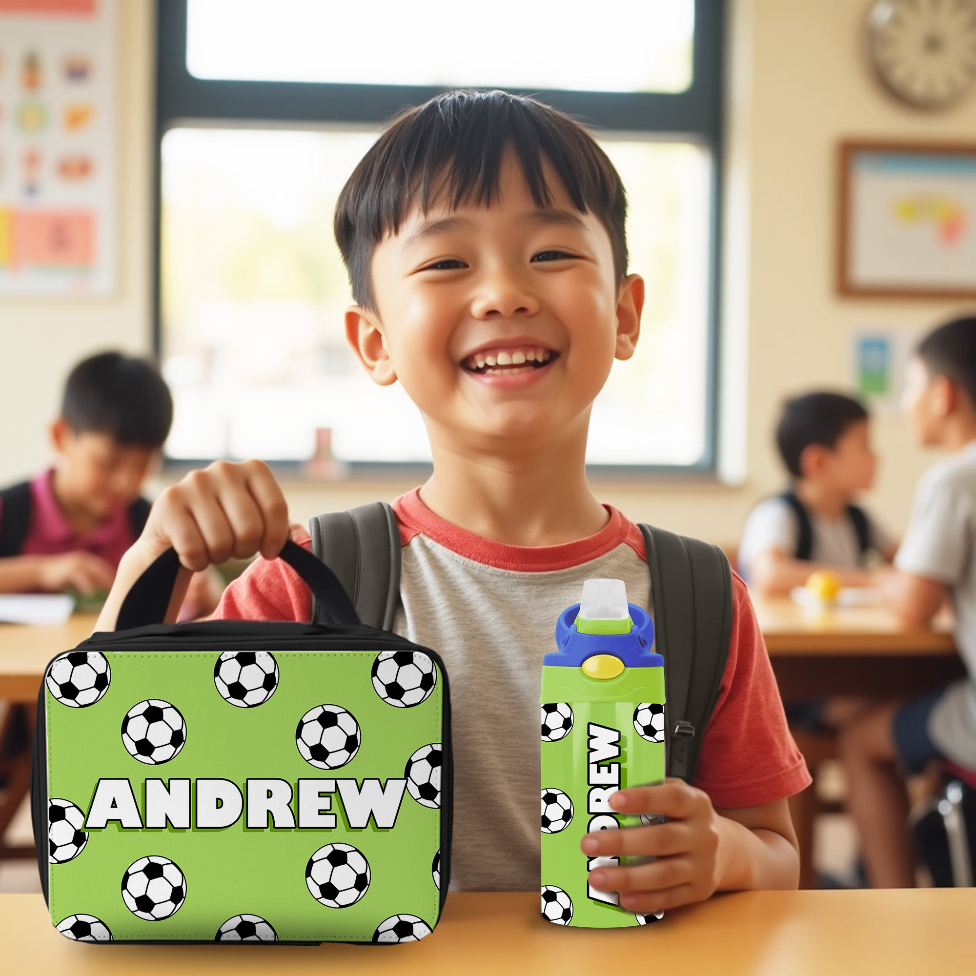 Custom soccer-themed lunch box and water bottle set personalized for kids.