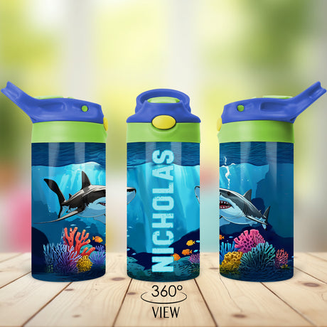 Back to school water bottle featuring a fun shark design and child’s name printed on the front.
