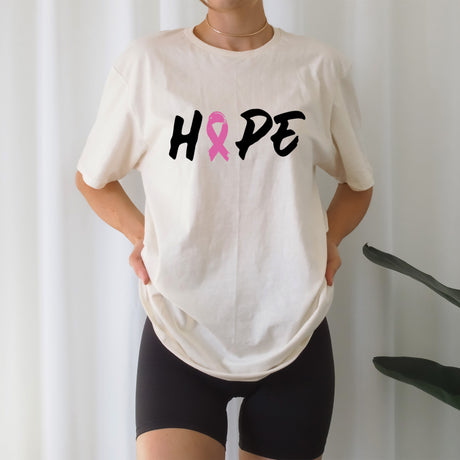 This pink-themed shirt spreads positivity and awareness for breast cancer causes.