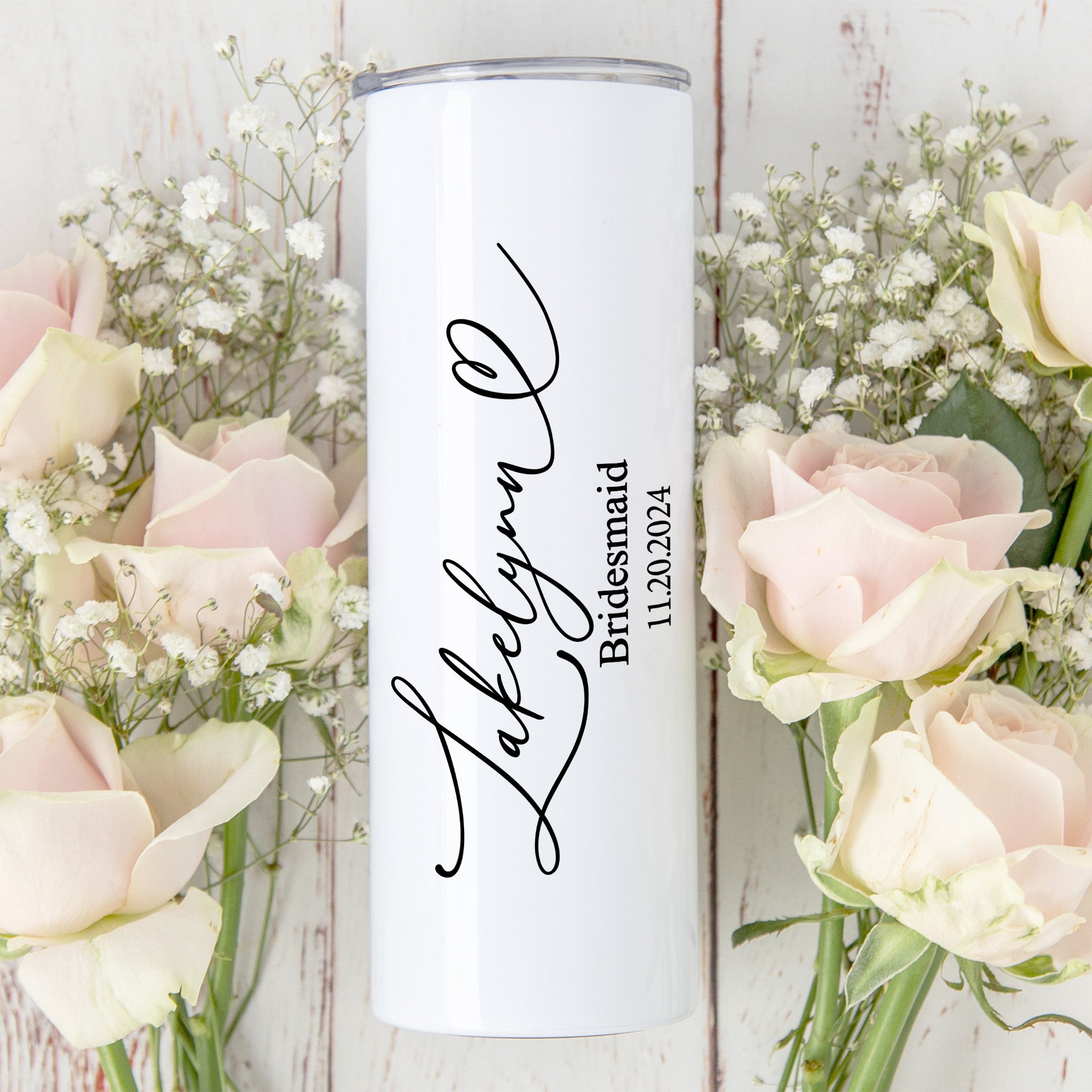 Personalized bridal party skinny tumbler with cursive name and title. Custom bridesmaid tumbler with name, title, and wedding date.