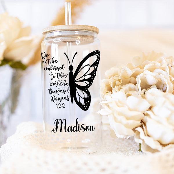 Christian Gift for Her with Romans 12 2 Bible Verse Printed on the Front with Partial Butterfly - 16oz Glass Coffee Tumbler