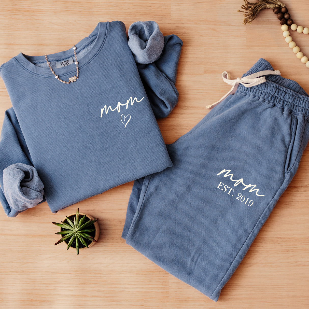 Flat lay of Comfort Colors sweat suit for women personalized sweat suit set. 