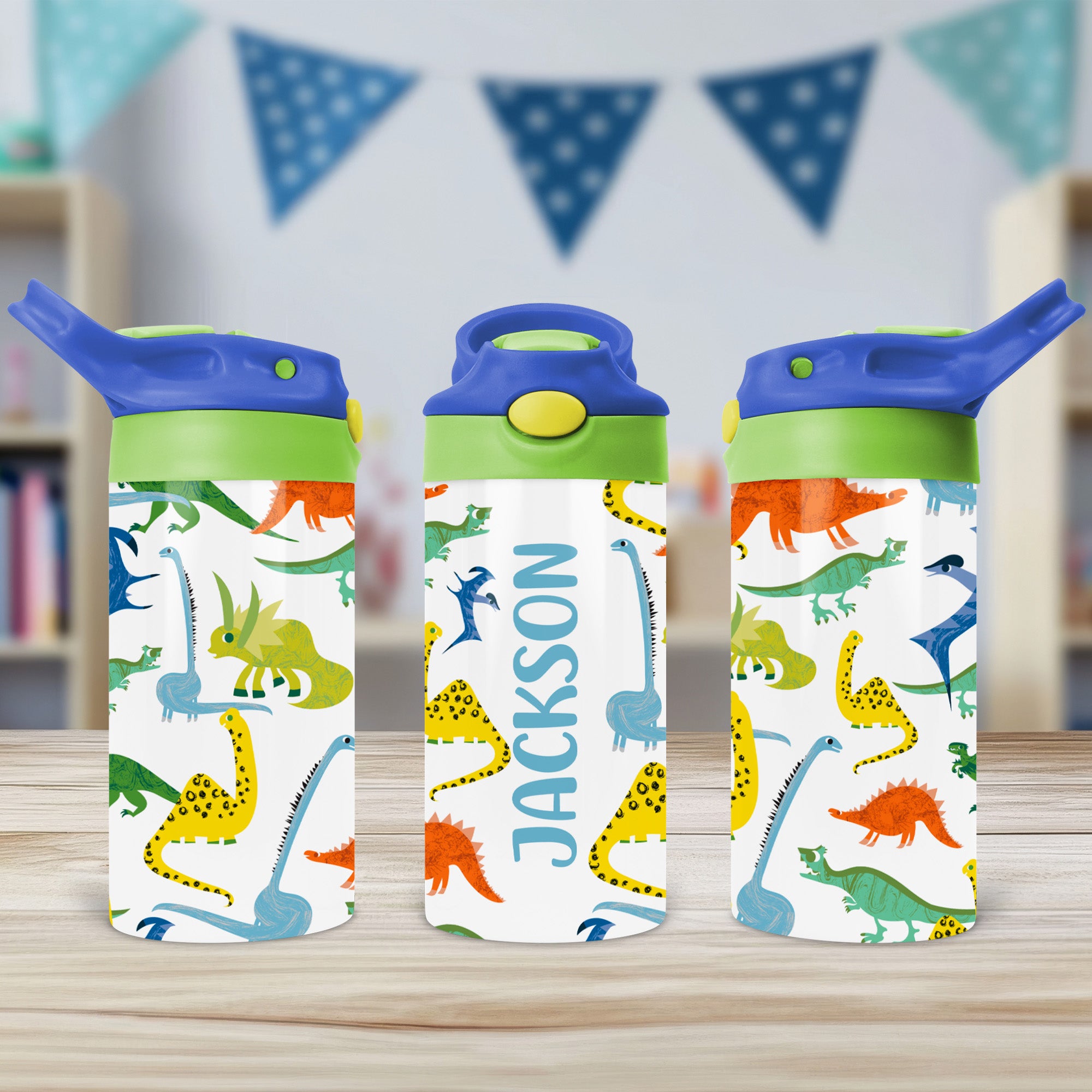 Personalized dinosaur water bottle for kids with custom name and flip top lid, ideal for school, toddlers, daycare, and back-to-school use.

