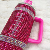 Close up of rhinestone tumbler with football applique.  all SKUs