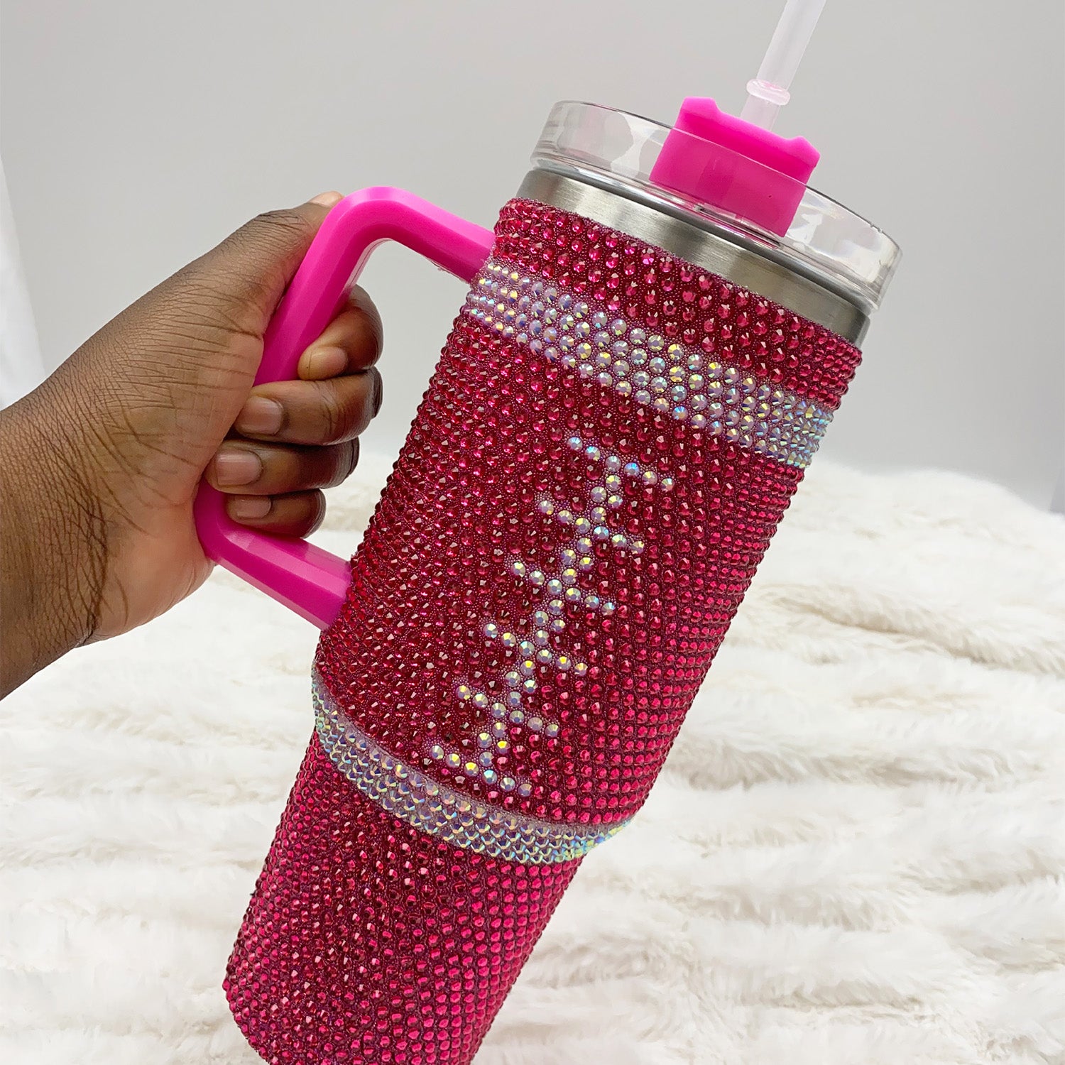 Football tumbler with cute bling rhinestone all around.  Bright Pink