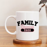 Matching personalized family reunion mugs with names used at large family gathering, custom reunion cups for family events.