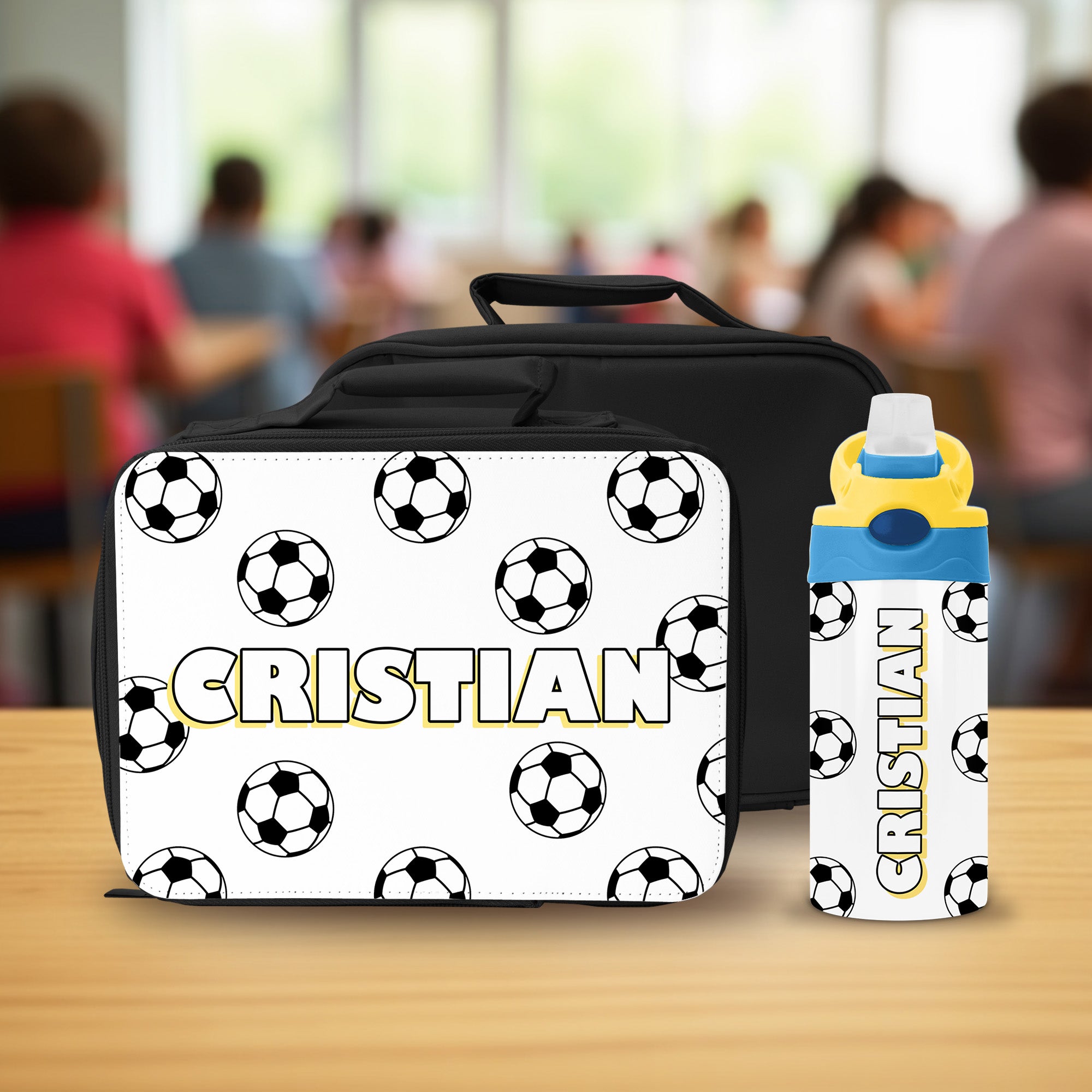 Personalized back to school gift featuring a soccer lunch box and water bottle with name.