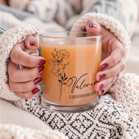 Bridesmaid holding custom birth flower mug, personalized clear or frosted iced coffee cup for bridal shower gift.
