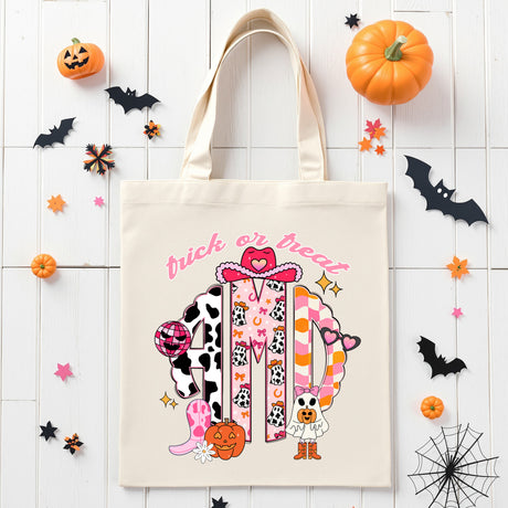 Cute pink cowgirl monogram Halloween bag for girls, great for trick or treat baskets and school parties.