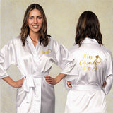 Personalized bride robe with name, last name, date and ring symbol.  This custom bride robe can be customized with any text.  Great for getting ready for wedding.  Several colors and sizes available. all SKUs