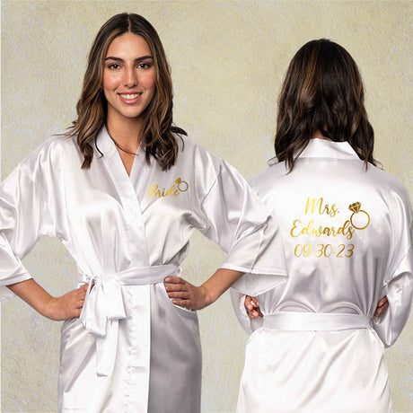 Personalized bride robe with name, last name, date and ring symbol.  This custom bride robe can be customized with any text.  Great for getting ready for wedding.  Several colors and sizes available. all SKUs