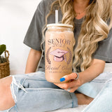 Woman holding Frosted 16oz senior 2024 Glass Tumbler with multi-colored Senior 2024 Social Club design. A graduation gift for her.  allSKUs