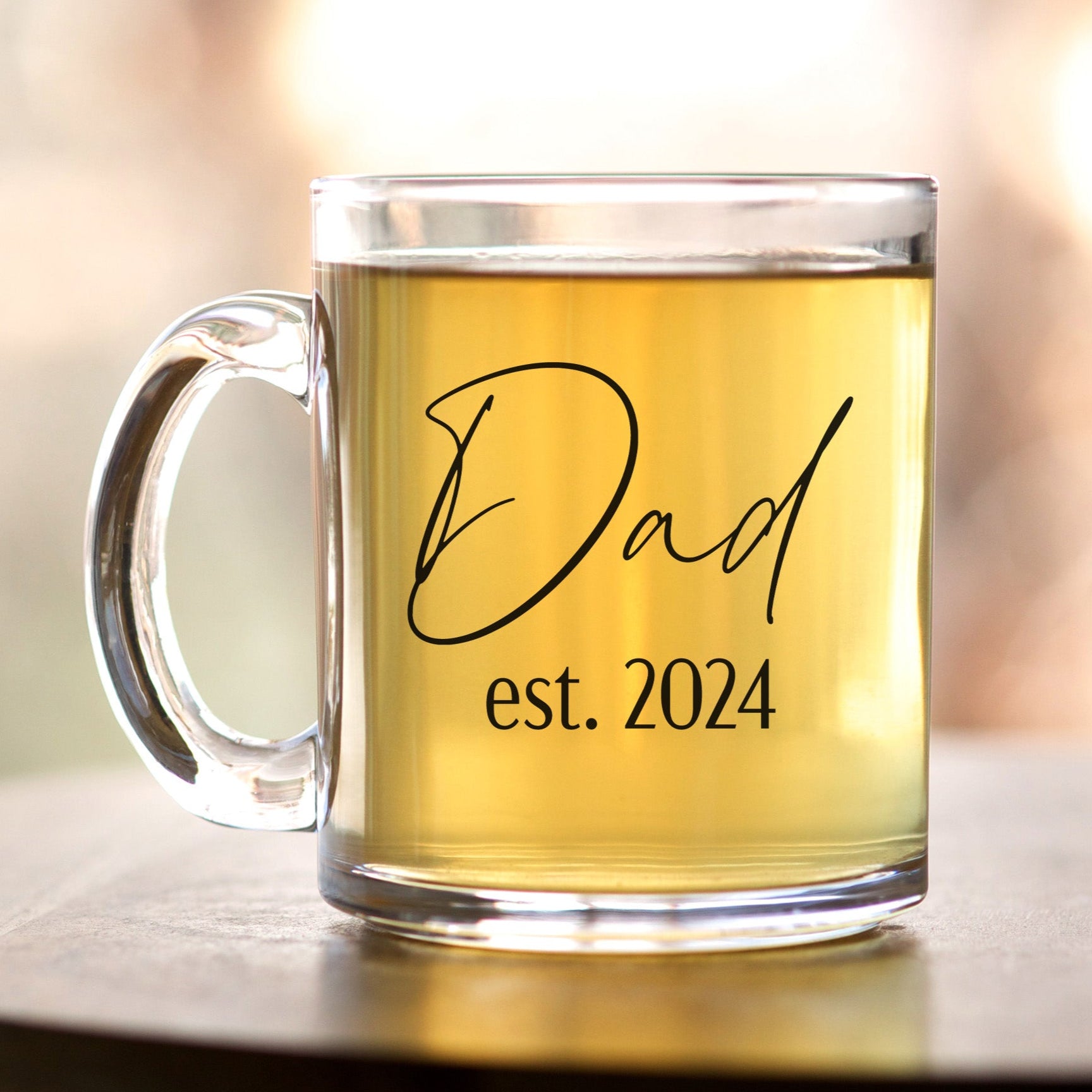 Personalized clear glass mug for Father’s Day with custom name and year.