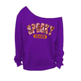 Purple Off The Shoulder Sweatshirt with Raw Edge Neckline and Spooky Season graphic for Halloween Parties.