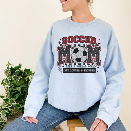 Trendy soccer mom wearing a sweatshirt in crewneck style, cozy and stylish for game day and everyday wear.