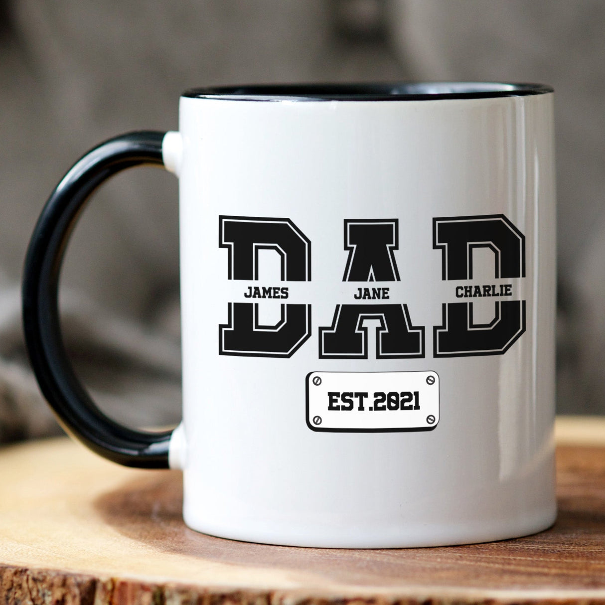 Unique Father’s Day gift ideas for dad. Coffee mug for dad with kids names printed in bold varsity lettering, available in 11oz or 15oz sizes.