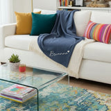 Cute personalized new homeowner gifts for her; personalized throw blanket with name printed on.