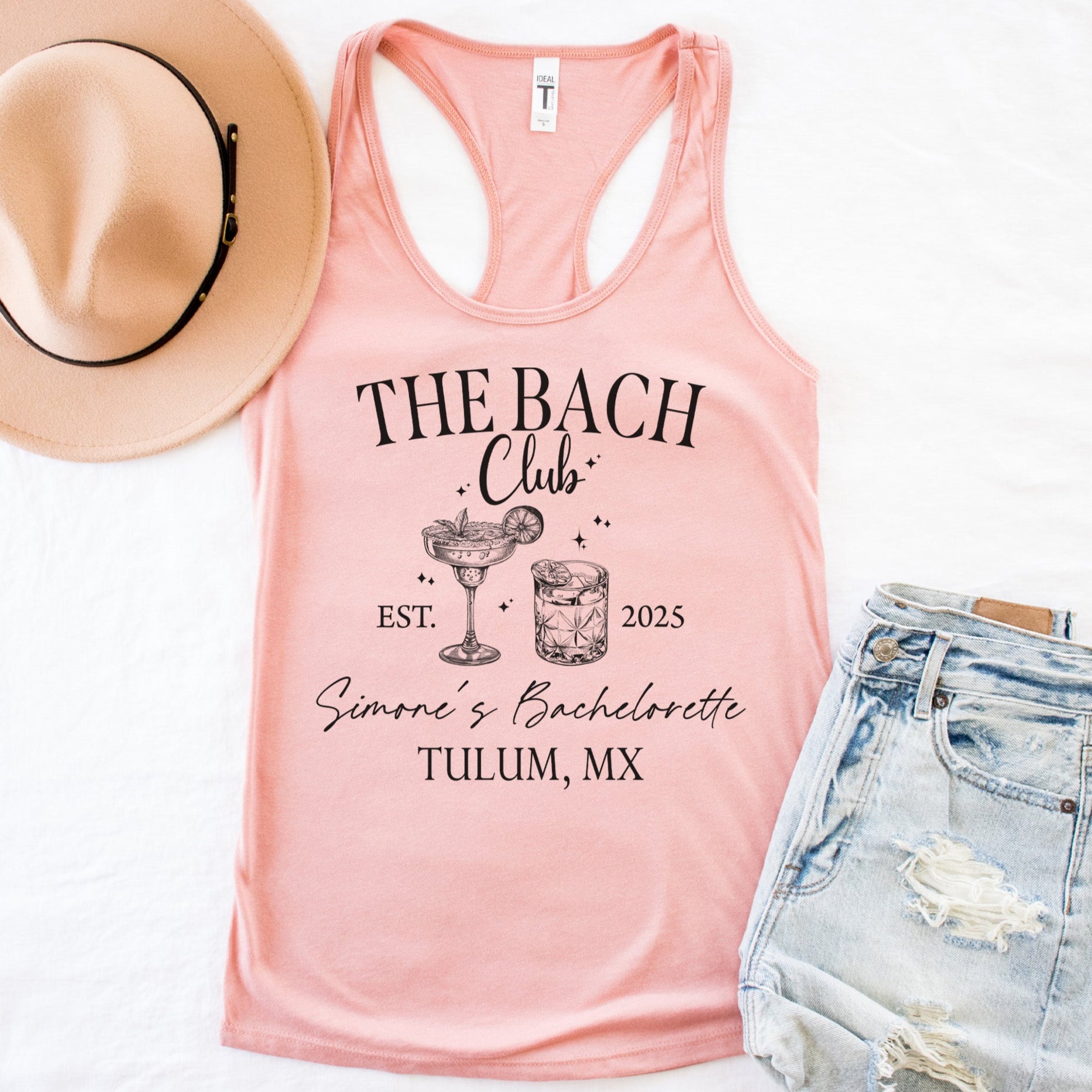 Custom bachelorette party tank tops flat lay with personalized bride and bridesmaid shirts, bridal party outfits, and matching bachelorette tanks for girls getaway.