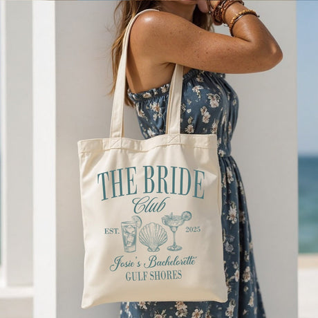 Custom bachelorette party tote bag with bridesmaid name, perfect for beach wedding favors.