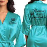 Satin turquoise blue quince robes with black glitter. Madrina de la quinceanera getting ready robes.