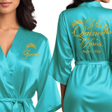 Personalized satin turquoise blue quinceanera robes. The perfect getting ready mis quince anos robes with gold glitter. Pretty quinceanera gifts.