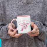 Woman holding a 2024 graduation mug for the senior class of 2024. All SKUs. 