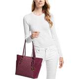Model holding Charlotte Tote Bag, Mulberry
