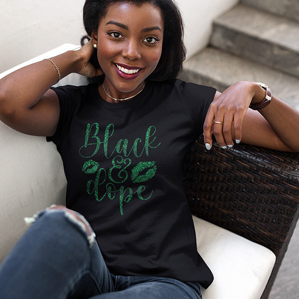 Black & Dope Tshirt that comes in a wide array of sizes, colors and styles.  Choose from Hoodies, Crop Tops, Sweatshirts, Tank Tops, Slouchy Tops and more.  Personalize shirts by choosing your color print, and if you would like style 1 or style 2.