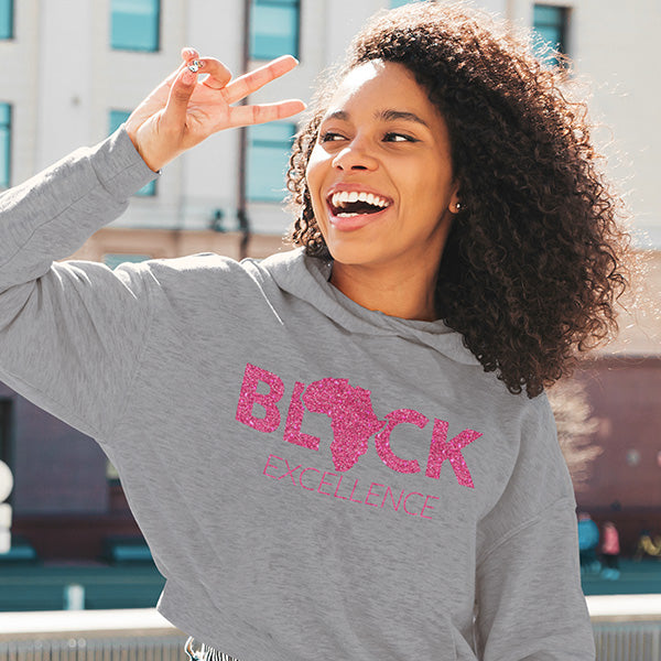 Personalize this shirt with glitter or use a standard color print.  This images shows our Black Excellence Crop Hoodie.  Other styles are also available including tshirts, vnecks, tank tops, long sleeve tee and sweatshirts.