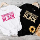 Unapologetically Black white t-shirt with light blue print.  Great statement shirt for all ages.