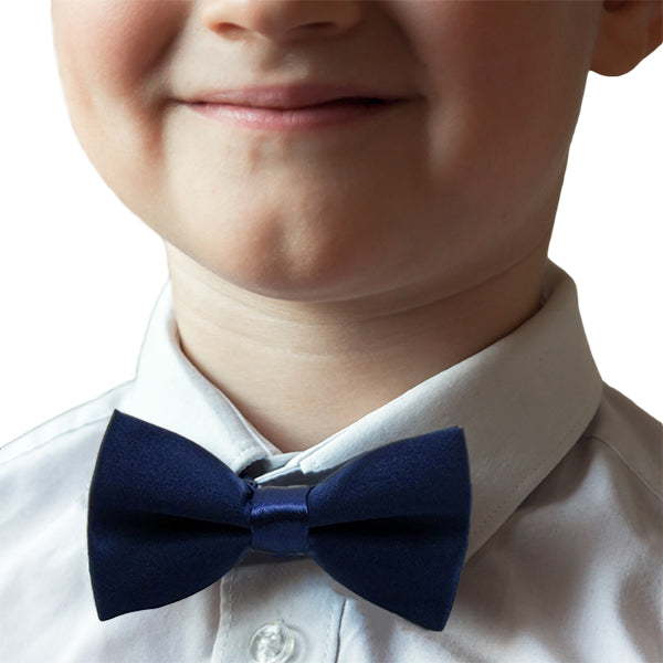 boy student wearing navy blue bow tie