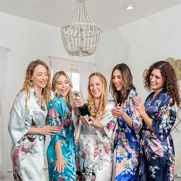 Getting Ready for Wedding Photos in Bridesmaid Robes - White & Blues