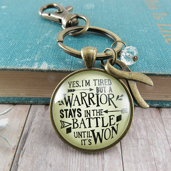 gutsy-goodness-yes-im-tired-warrior-stays-in-the-battle-until-its-won-alt1, Motivational Keychains, Gifts For Cancer Free Patients, Inspirational Gifts