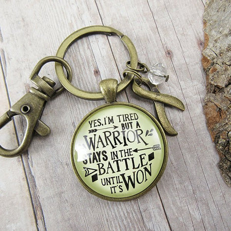 gutsy-goodness-yes-im-tired-warrior-stays-in-the-battle-until-its-won-alt2, Motivational Keychains, Gifts For Cancer Free Patients, Inspirational Gifts