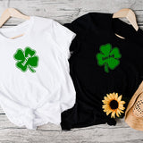 White and Black lucky shirts for St. Pattys Day Shirts.  Features a Green Clover with the words Lucky in the middle.  Get one for every member of the family or group.