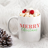 Merry Christmas mug in red and green font color.