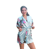 model wearing short floral sky blue robe frontview