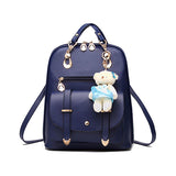 navy blue backpack w charm