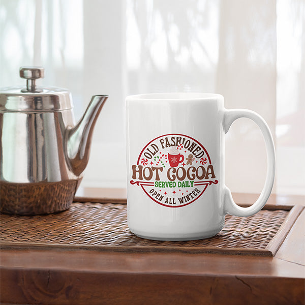 White ceramic coffee mug with holiday design for the Christmas and Winter season.
