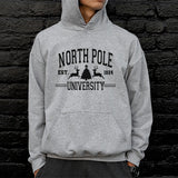 North Pole University Christmas Hoodie.  A great gender neutral hoodie for the Christmas season featuring reindeers and a Christmas tree. all SKUs