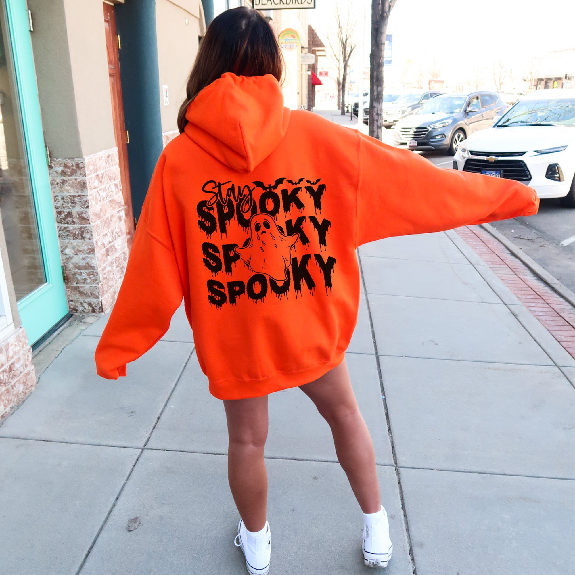 Cute and spooky Halloween Hoodie. Very cute front and back Stay Spooky design that looks so cute on black and orange hoodies. all SKUs