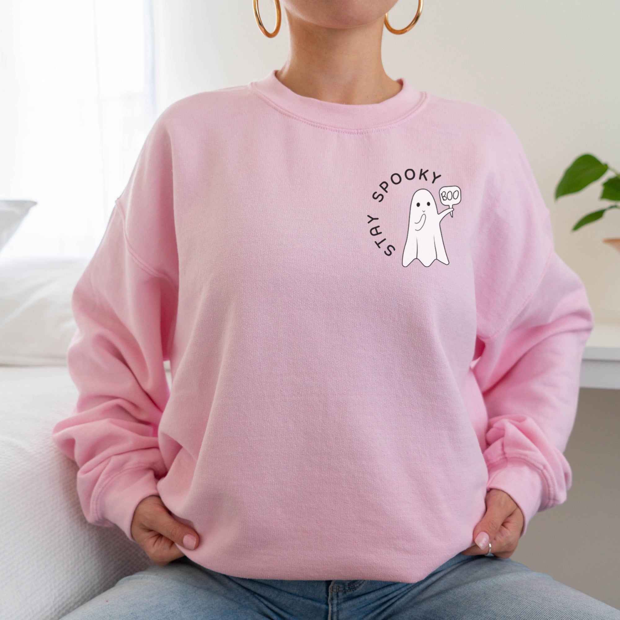 Cute Halloween Sweatshirt for women featuring the words Stay Spooky with a friendly ghost. all SKUs