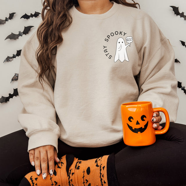 A cute Halloween Sweatshirt for women with text Stay Spooky. all SKUs