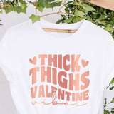 Shop our Thick Thighs Valentine Vibes tops that are available as a tshirt, crop top, crop hoodie, long sleeve tee, sweatshirt or hoodie.  We offer several colors and sizes from XS to 6XL. all SKUs