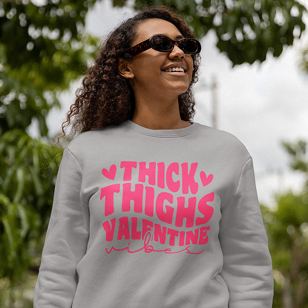 Funny Valentines Shirt with the text Thick Thighs Valentine Vibes for curvy women of all ages and sizes.  all SKUs